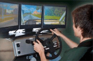 Teen using driving simulator
