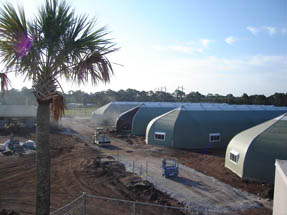 Tents are up, now it is time for pavement.